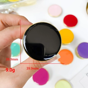 Glossy black and gold circular retractable phone grip, 39.9mm diameter enamel phone stand