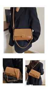 Détail d'un sac à bandoulière marron vintage avec fermoir labyrinthe doré