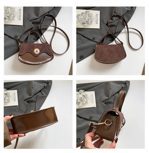 Detail of retro brown patchwork handbag showing rotating gold lock and suede texture flap