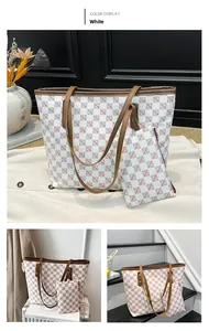 Detailed view of white tote bag set with brown geometric patterns and matching pouch