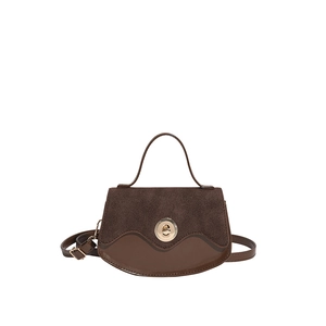 Vintage brown shoulder bag with mixed texture panels and gold metal twist lock