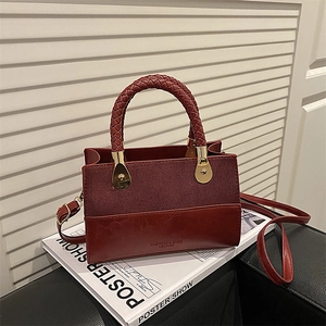 Retro burgundy patchwork crossbody bag with textured suede finish and woven handle
