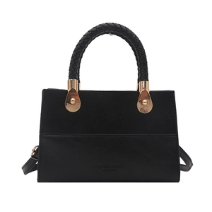 Chic black leopard splice handbag for women with round woven handles and leather finish