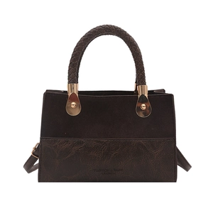 Retro dark brown patchwork handbag with woven handle and matte leather finish for women