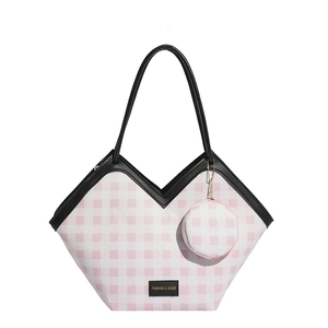 Pink plaid tote bag with V-shaped opening, black leather handles and mini round purse