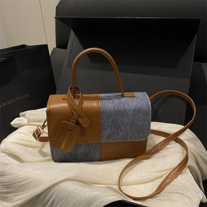 Minimalist crossbody messenger bag with brown leather and grey wool texture contrast