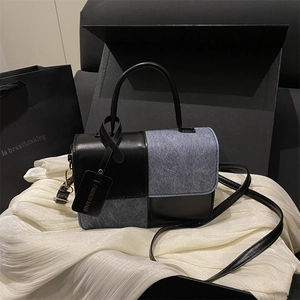 Minimalist bicolor crossbody bag in black leather and grey fabric with checkered design