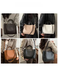 Modelfotos zeigen verschiedene Tragemöglichkeiten der strukturierten Bucket Bag in vielen Farben