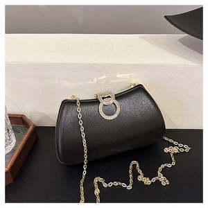 Elegant black evening clutch with gold chain strap and sparkling rhinestone double ring buckle