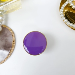Foldable purple epoxy phone socket with gold rim and smooth aesthetic finish