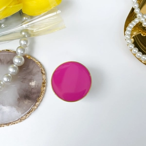 Minimalist round phone grip in rose pink gloss finish with elegant golden metal rim