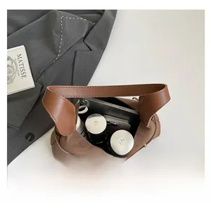 Interior view of large capacity suede tote bag with tablet and phones inside