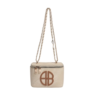 Chic beige crossbody box bag with brown letter patch and gold chain strap
