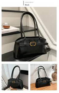 Vues détaillées d'un sac à main noir vintage doté d'une boucle dorée rectangulaire