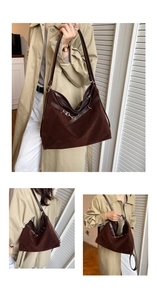 Close-up of matte dark brown suede tote bag with leather straps and gold metal hooks