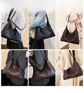 Detail showing the large capacity matte leather tote bag in black and dark brown colors