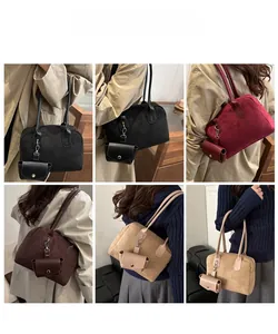 Suede bowling bag set showing model wearing large tote and matching pouch