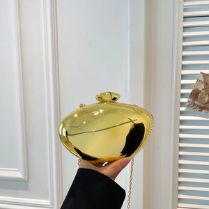 Luxury oval gold mirror finish hard shell evening clutch with metallic chain strap