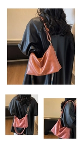 Detail of large tote bags in mustard and pink featuring stylish knotted shoulder straps