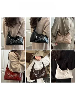 Multiple views of high-gloss crescent shoulder bags in various colors on models