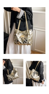 Macro detail of large metallic sequins on tote bag with woven shoulder straps and leather patch