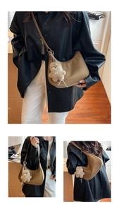 Brown crescent shoulder bag with plush bear charm worn by a model in different poses