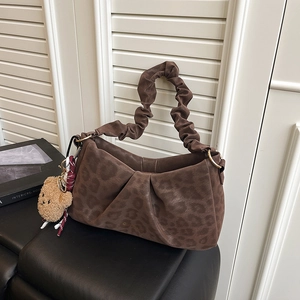 Brown leopard print suede shoulder bag with ruched handle and cute plush bear charm