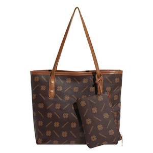 Vintage patterned tote bag set with matching pouch and brown leather straps