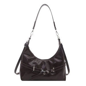 Glossy dark brown patent leather underarm bag with silver buckle and retro style