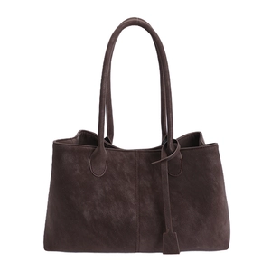 Vintage brown pebbled leather tote bag with long straps and minimal stitching details