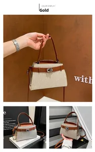Detail of glittery gold handbag with brown leather straps and metal twist lock
