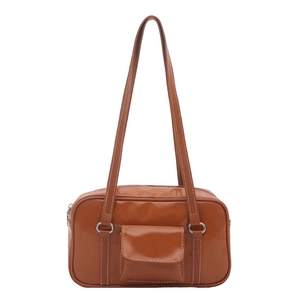 Brown vintage style faux leather shoulder bag with white stitching and silver ring hardware
