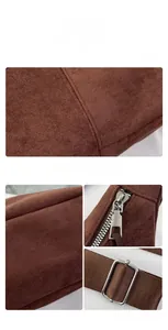 Detail view of brown suede tote bag showing precision stitching and silver metal hardware