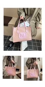 Detail of pink tote bag with M monogram pattern and large embossed letter design