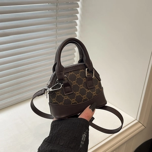 Mini vintage monogram shoulder bag with dual top handles and long crossbody strap