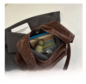 Spacious leopard print tote bag interior showing capacity for umbrella and wallet