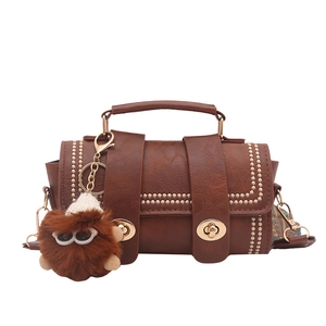 Chic brown PU leather handbag with gold metal handle and cute owl plush keychain