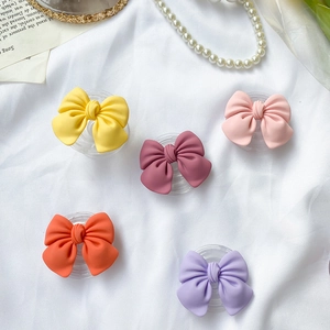 Chic bow-shaped matte phone griptok set in pastel colors with expandable grip stand