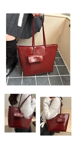 Close-up of burgundy glossy tote bag with matching coin purse and slim shoulder straps