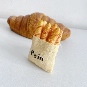Supporto creativo per telefono a forma di pane con baguette realistica e mini borsa in tessuto