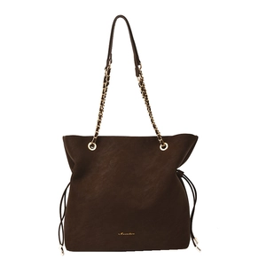 Dark brown suede bucket bag with gold chain strap and drawstring details on white backdrop