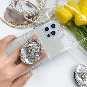Baroque silver relief phone socket with elegant face design on glitter case