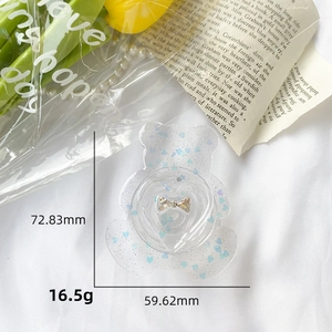 Blue sequin bear phone grip with bow detail showing 72.83mm height and 59.62mm width