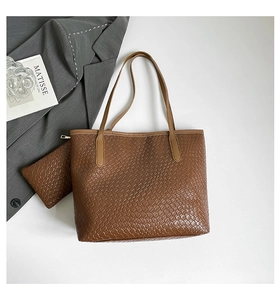 Caramel brown woven tote bag set with matching zipper pouch and textured finish