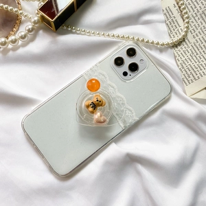 Detail of glitter phone case with white lace edge and 3D bear heart expanding stand