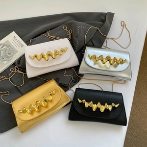 Modern leather crossbody bags with wavy gold hardware and thin chain straps in four colors