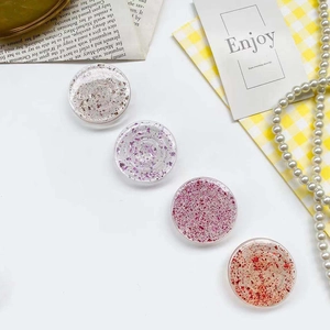 Set of four glittering resin phone sockets in silver, purple, pink and red colors