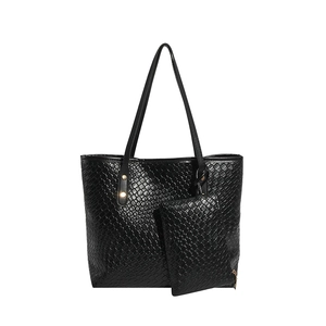 Minimalist black woven texture tote bag with matching coin purse on white background