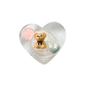 Glittery heart phone grip with 3D teddy bear and pastel bead accents on white background