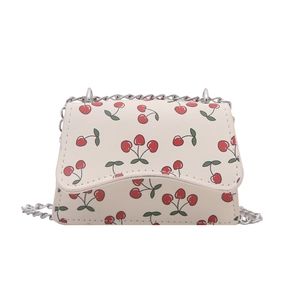 Minimalist white crossbody bag with cherry prints and silver chain strap